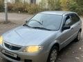 Mazda 323 2002 года за 2 000 000 тг. в Караганда – фото 2