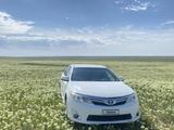 Toyota Camry 2014 года за 4 750 000 тг. в Жанаозен