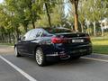 BMW 750 2015 года за 22 800 000 тг. в Алматы – фото 12
