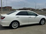 Toyota Camry 2014 года за 11 300 000 тг. в Атырау – фото 2