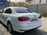 Volkswagen Passat 2014 года за 5 990 000 тг. в Алматы