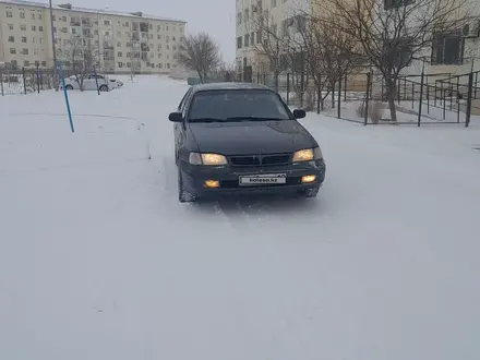 Toyota Carina E 1997 года за 1 500 000 тг. в Жанаозен