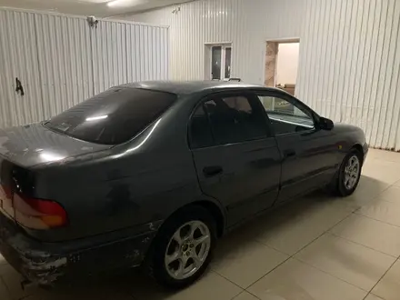 Toyota Carina E 1997 года за 1 500 000 тг. в Жанаозен – фото 4