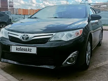 Toyota Camry 2014 года за 8 600 000 тг. в Актобе