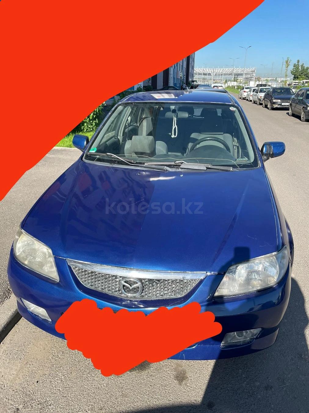 Mazda 323 2001 г.