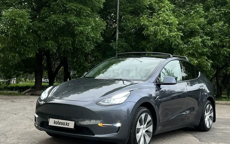 Tesla Model Y 2022 года за 26 000 000 тг. в Алматы