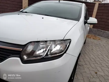 Renault Logan 2015 года за 4 500 000 тг. в Актобе – фото 15