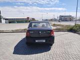 Renault Logan 2006 года за 600 000 тг. в Атырау – фото 4