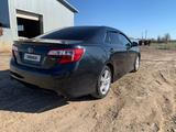 Toyota Camry 2013 годаүшін5 800 000 тг. в Уральск – фото 2