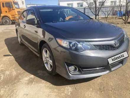 Toyota Camry 2013 года за 8 700 000 тг. в Кульсары – фото 2