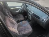 Renault Logan 2012 года за 1 550 000 тг. в Алматы – фото 4
