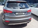 Hyundai Santa Fe 2014 годаүшін9 050 000 тг. в Экибастуз