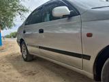 Toyota Carina E 1996 года за 1 900 000 тг. в Шолаккорган – фото 3