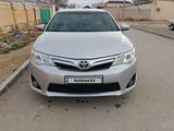 Toyota Camry 2012 года за 8 100 000 тг. в Жанаозен