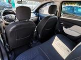 Renault Logan 2015 года за 2 550 000 тг. в Атырау – фото 4
