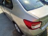 Renault Logan 2015 года за 2 550 000 тг. в Атырау – фото 2