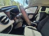 Renault Logan 2015 года за 2 550 000 тг. в Атырау – фото 3