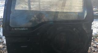 Крышка багажника Мицубиси Паджеро ИО 98г за 3 000 тг. в Алматы