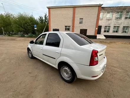 Renault Logan 2014 года за 2 200 000 тг. в Актобе – фото 15