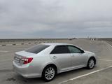 Toyota Camry 2012 года за 5 500 000 тг. в Жанаозен – фото 2