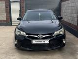 Toyota Camry 2014 года за 9 000 000 тг. в Караганда