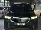 BMW X5 2024 года за 50 000 000 тг. в Алматы