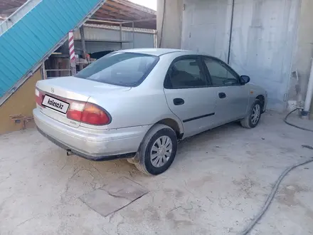 Mazda 323 1998 года за 1 300 000 тг. в Актау – фото 2