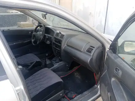 Mazda 323 1998 года за 1 300 000 тг. в Актау – фото 4