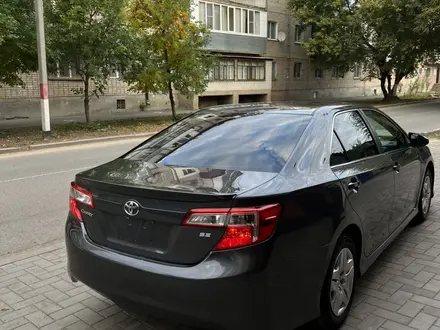 Toyota Camry 2014 года за 6 100 000 тг. в Уральск – фото 4