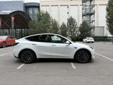 Tesla Model Y 2022 года за 16 200 000 тг. в Алматы – фото 5