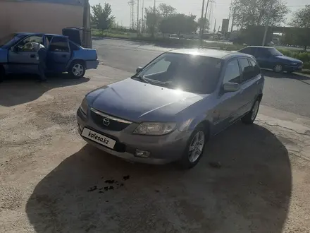 Mazda 323 2002 года за 2 600 000 тг. в Шымкент – фото 3