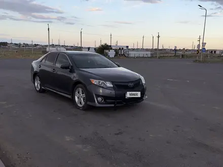 Toyota Camry 2014 года за 8 500 000 тг. в Атырау