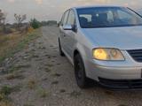 Volkswagen Touran 2005 года за 3 200 000 тг. в Алматы – фото 5