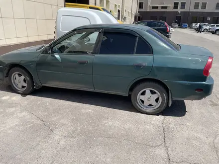 Mitsubishi Mirage 1998 года за 1 300 000 тг. в Астана – фото 9