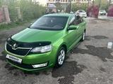 Skoda Rapid 2013 года за 4 500 000 тг. в Караганда