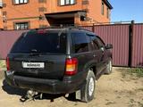 Jeep Grand Cherokee 2004 года за 4 500 000 тг. в Актобе – фото 3