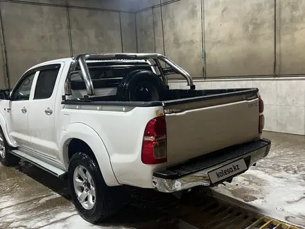 Toyota Hilux 2011 года за 6 999 999 тг. в Жанаозен – фото 7