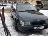 Toyota Carina E 1997 годаүшін1 800 000 тг. в Актобе – фото 2