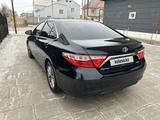 Toyota Camry 2015 года за 7 800 000 тг. в Жанаозен – фото 3