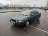 Mazda 626 1990 года за 850 000 тг. в Астана – фото 4