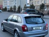 Mazda 323 2002 года за 2 600 000 тг. в Алматы – фото 4