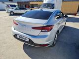 Hyundai Elantra 2019 года за 8 500 000 тг. в Айтеке би – фото 4