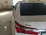 Toyota Corolla 2014 года за 6 700 000 тг. в Караганда – фото 2