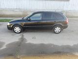 Mazda 323 2000 года за 2 100 000 тг. в Алматы – фото 4