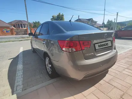 Kia Cerato 2011 года за 4 500 000 тг. в Атырау – фото 5