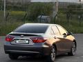Toyota Camry 2017 года за 10 450 000 тг. в Алматы – фото 14