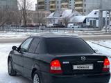 Mazda Protege 2001 годаүшін2 000 000 тг. в Байконыр – фото 5