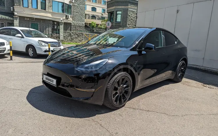 Tesla Model Y 2021 года за 31 500 000 тг. в Алматы