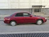 Mazda Cronos 1995 годаfor1 100 000 тг. в Шымкент – фото 2