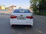 Kia Rio 2013 года за 4 600 000 тг. в Атырау – фото 4